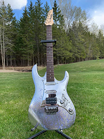 Silver plated electric guitar