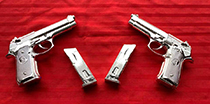 Silver plated guns and clips